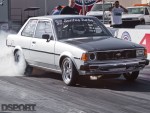 Santo's 8 second Drag Corolla doing a burnout at Fontana Dragway