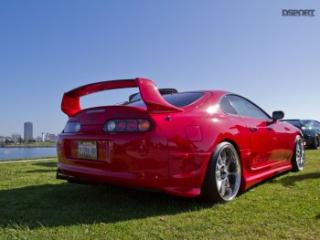 Rear of red toyota supra in Long Beach