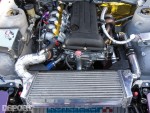 The clean engine bay of the SR-powered drift AE86
