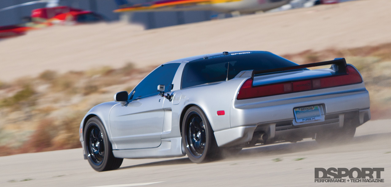 The turbocharged Acura NSX doing blasts on the airport runaway