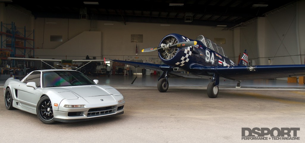 The turbocharged Acura NSX sitting in the plane hangar