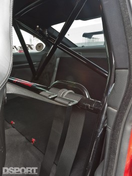 The backseat roll bar and harness for Ricky Kwan's BMW M3