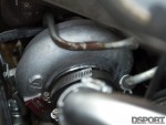 Forced performance red turbo in Bruzewski's Mitsubishi EVO VIII