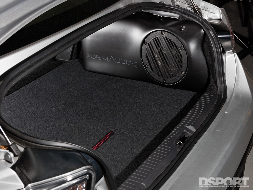The trunk of the FR-S with OEM Audio+ sound system
