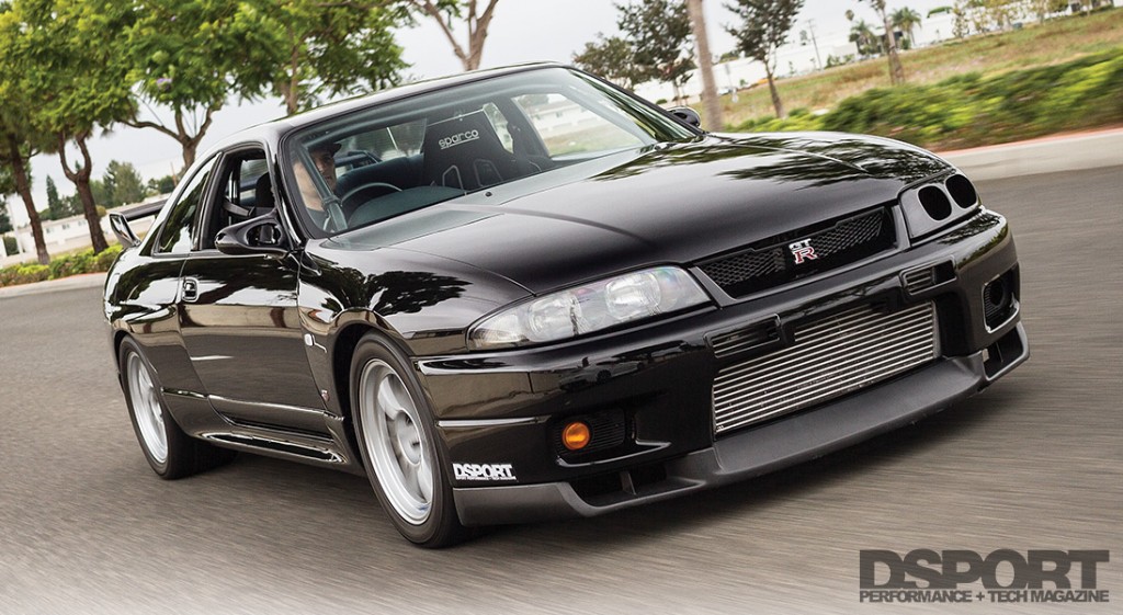 D'Garage R33 driving on the street
