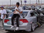 Car show attendee eats lunch at Fontana Dragway